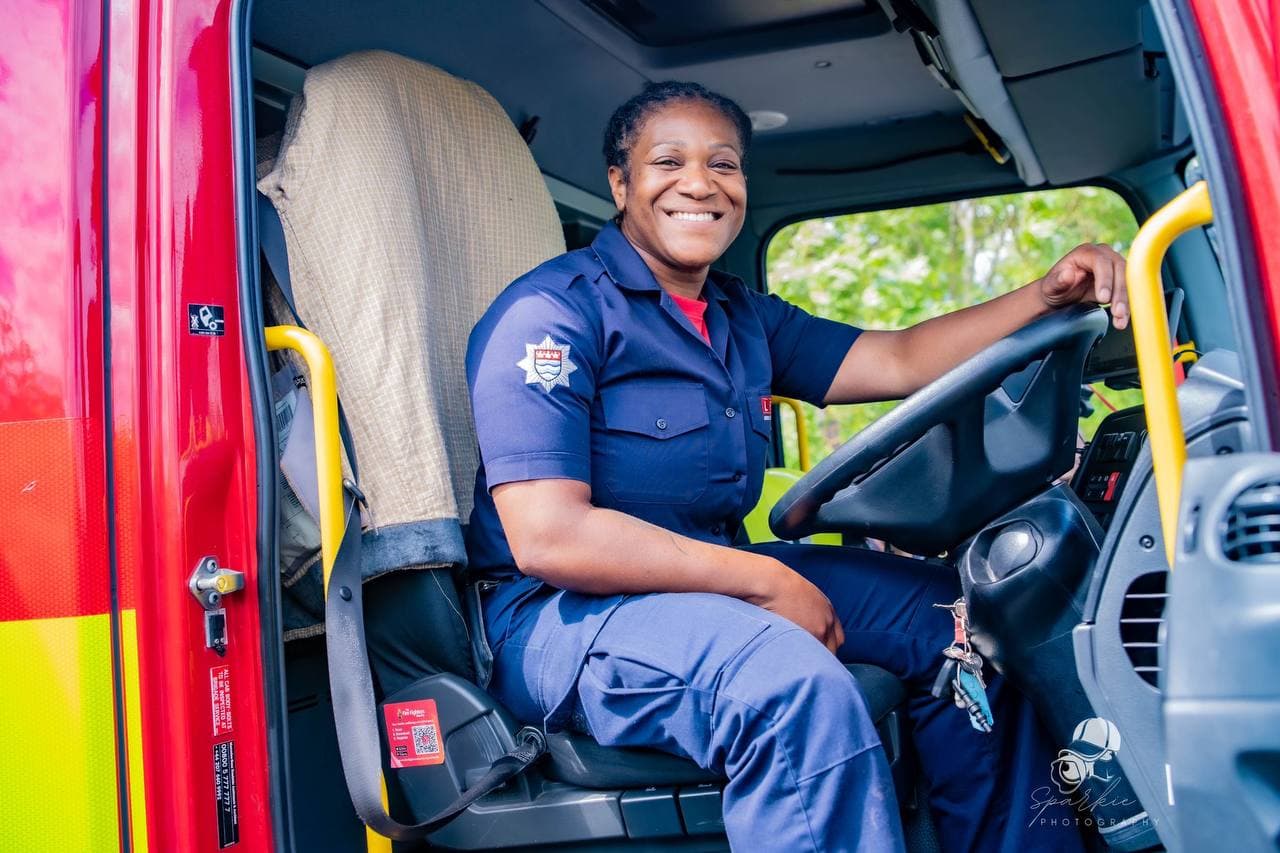 Firefighter sitting in the fire engine during Roots & Wings 2024