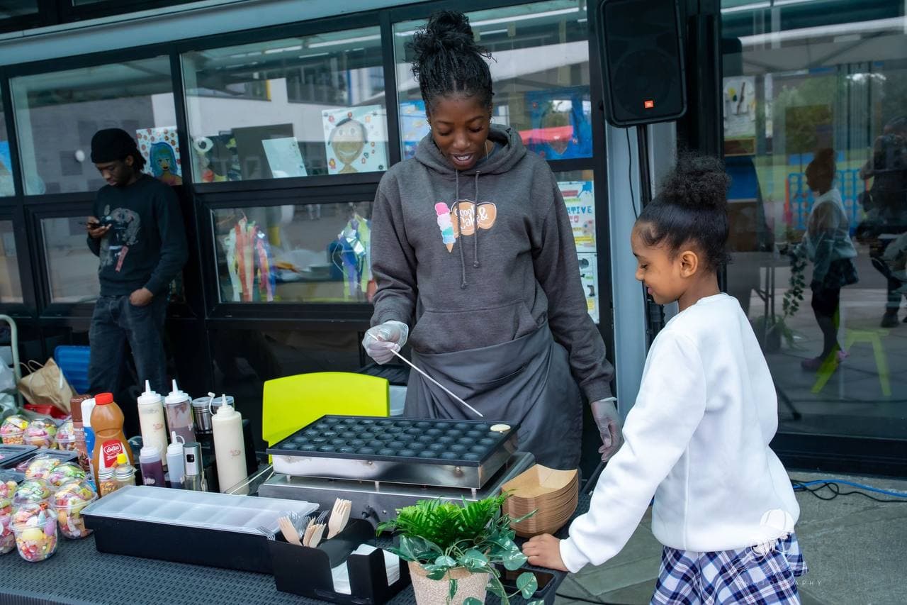 Food stall serving visitors at Roots & Wings 2024