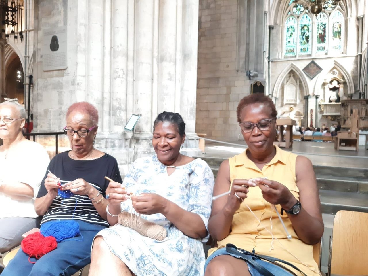 Group members knitting during the Big Knit Day visit at Southwark Cathedral